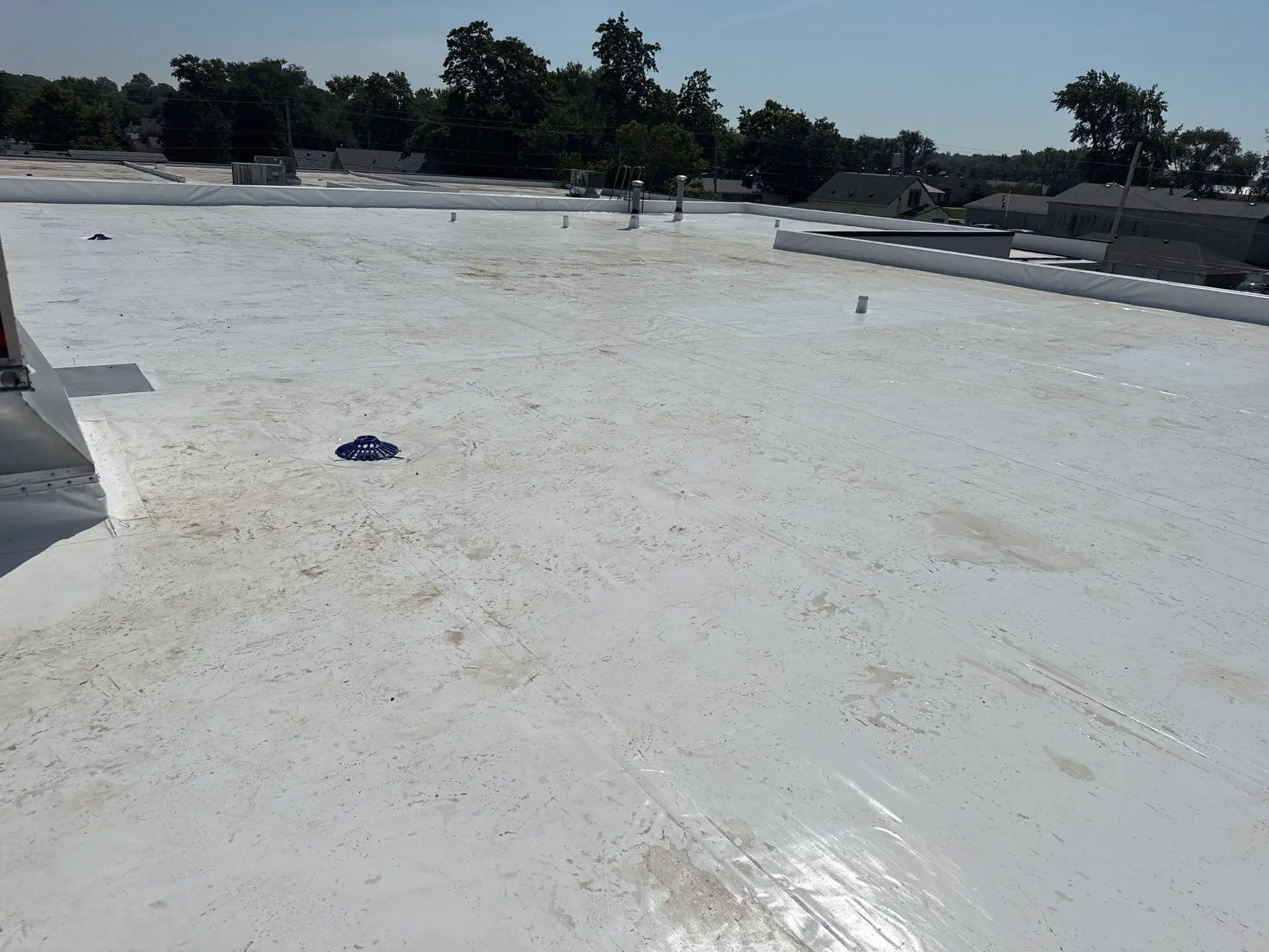 Long white Duro-Last roof on a manufacturing plant in Rock Island, Illinois