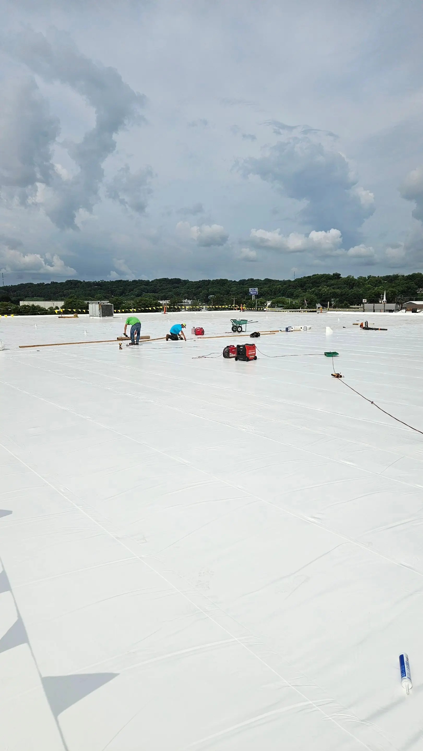 Wide white Duro-Last roof on a distribution warehouse in Davenport, Iowa