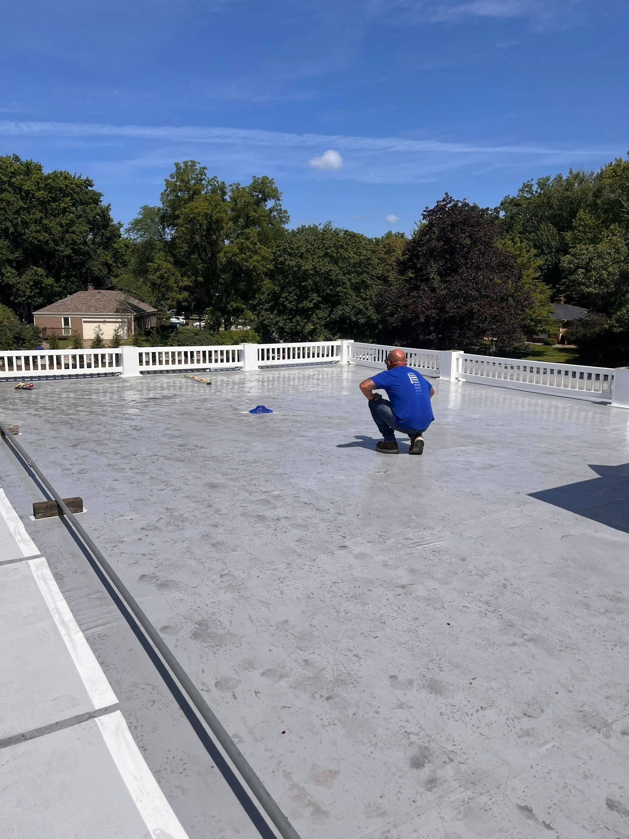 White Duro-Last roof on a real-estate office in Bettendorf, Iowa