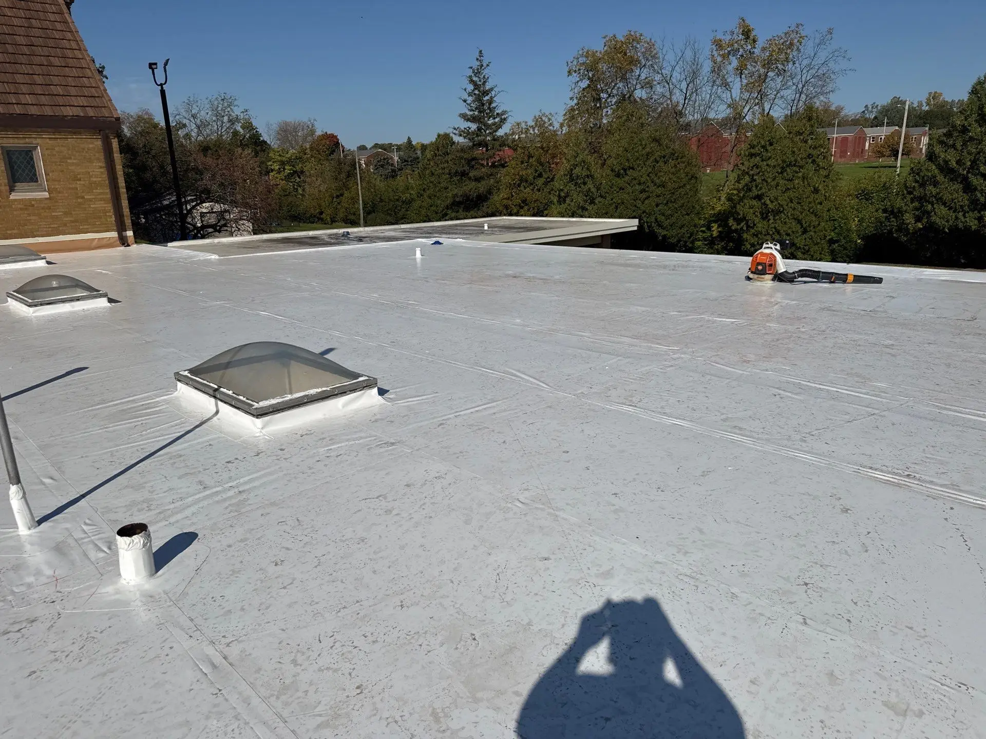 White Duro-Last roof on a brick church in Clinton, Iowa